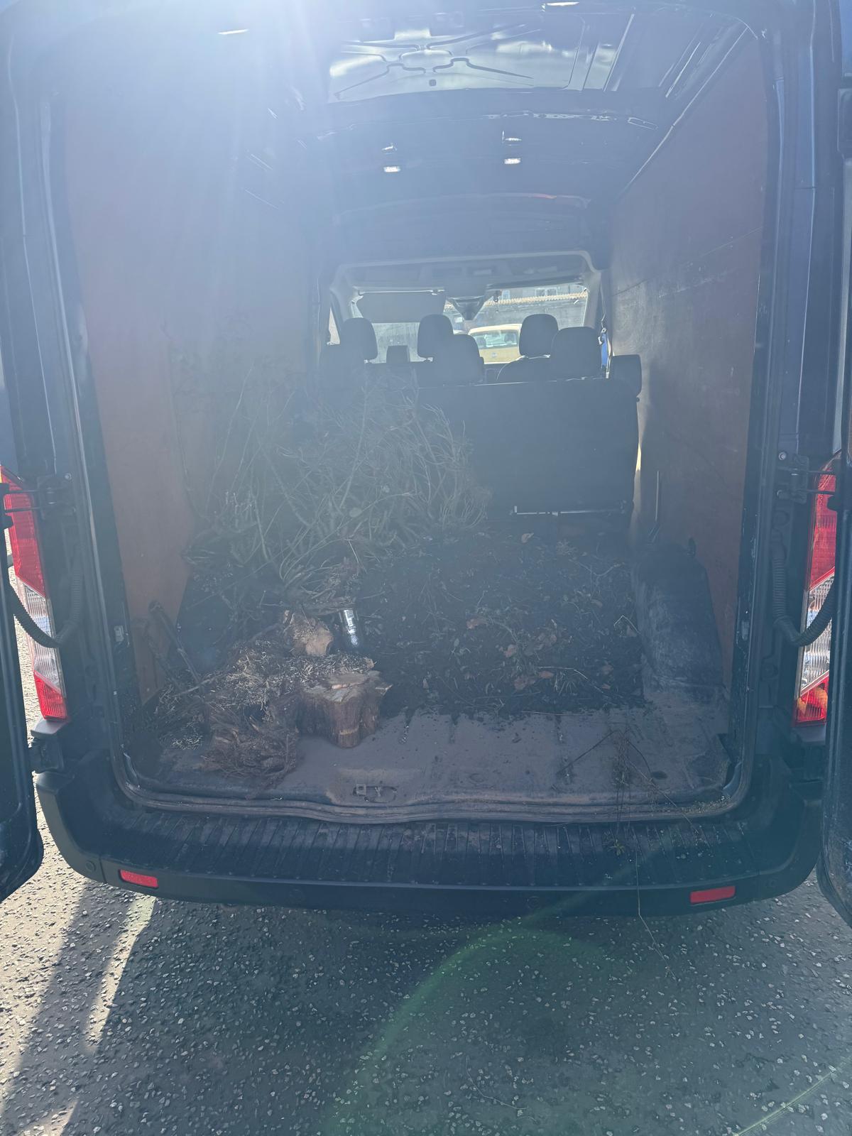 Garden waste removal van loaded after front garden clearance